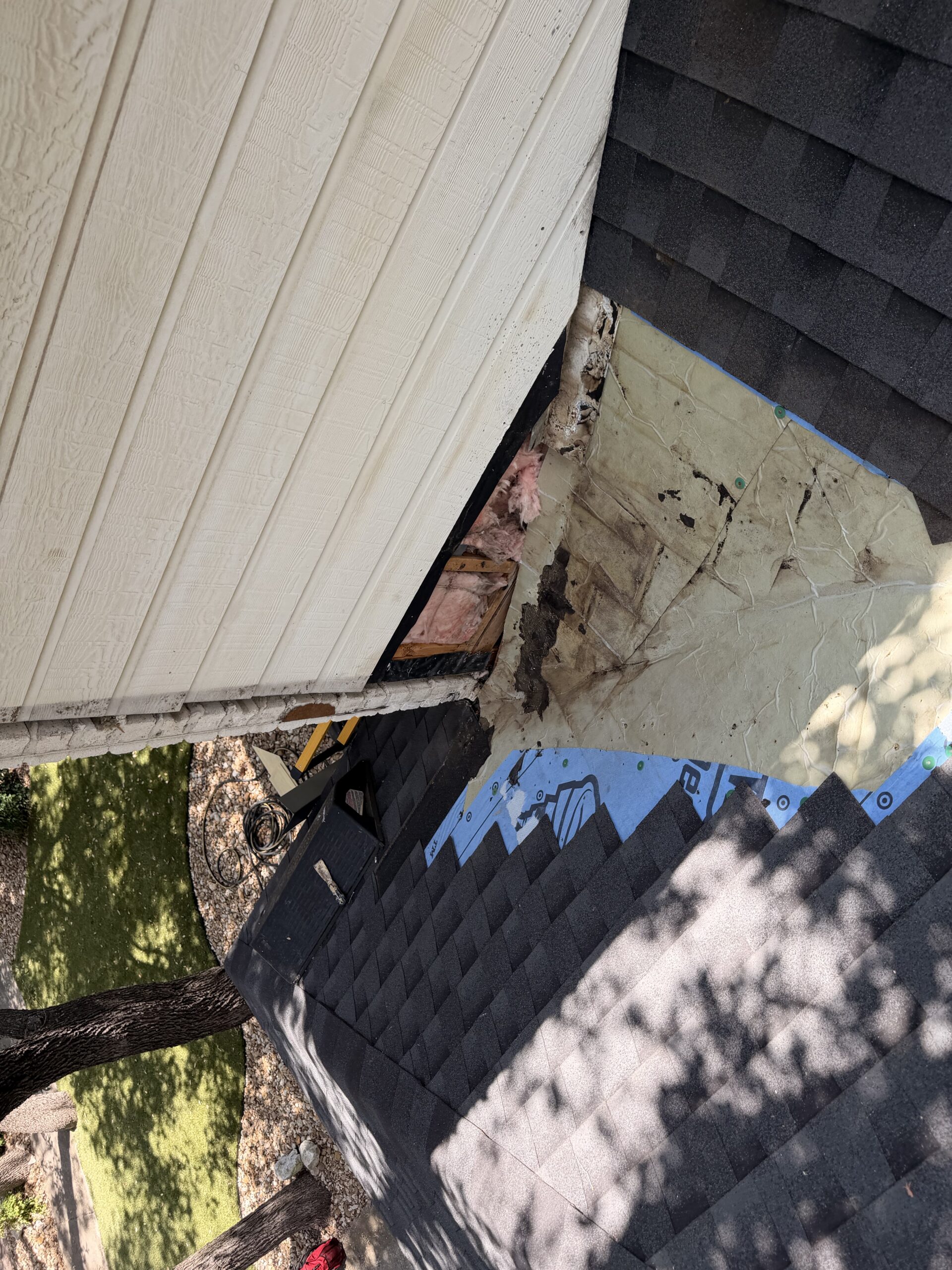 Roofing opened at sidewall and valley during residential flashing repair in San Antonio, TX